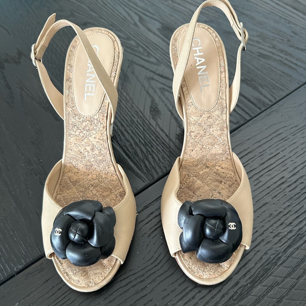 CHANEL Beige and Black Women's Shoes. Used in acceptable condition.